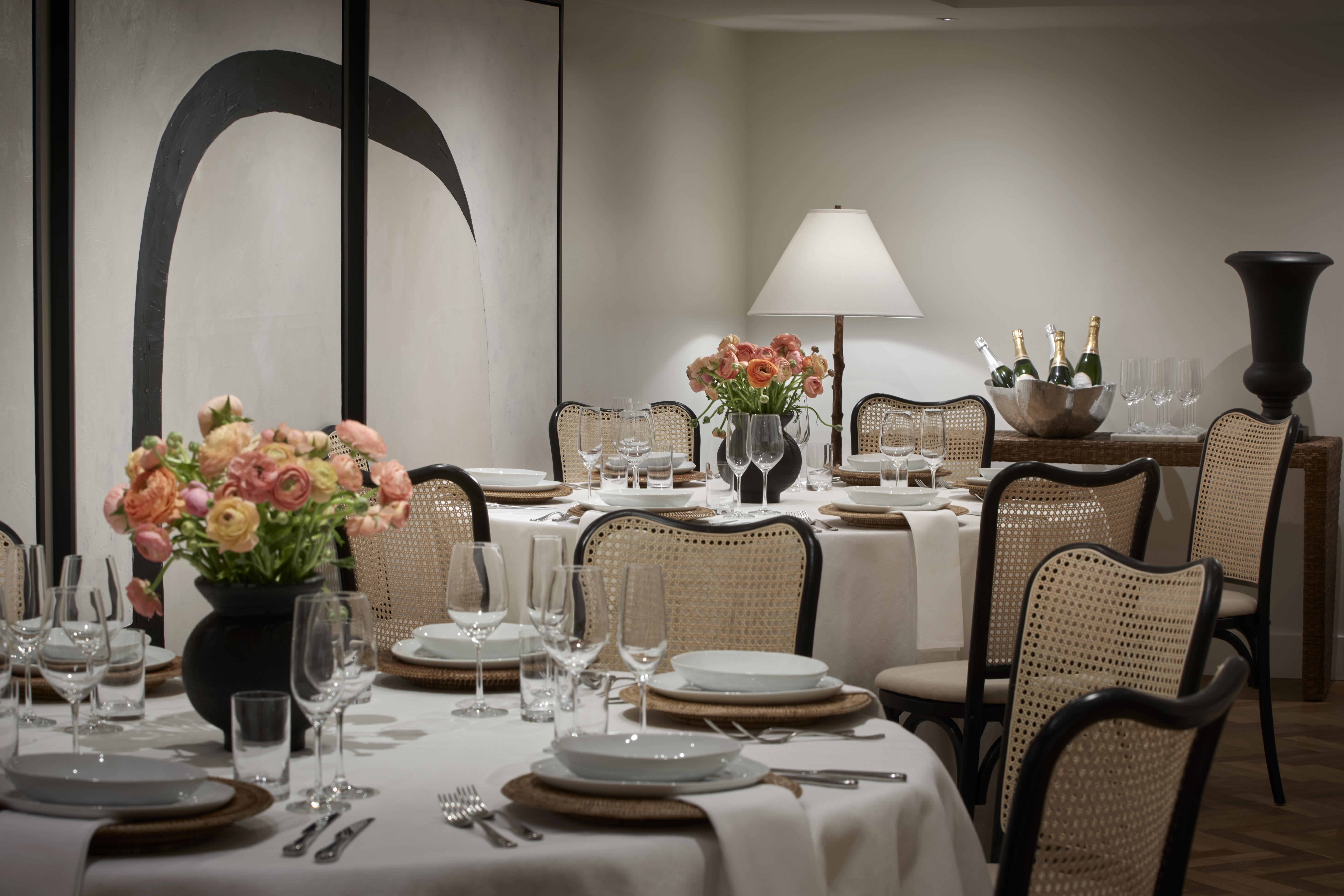a formal dining room with a table set for a meal