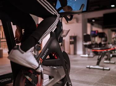Close up of foot on peloton bike