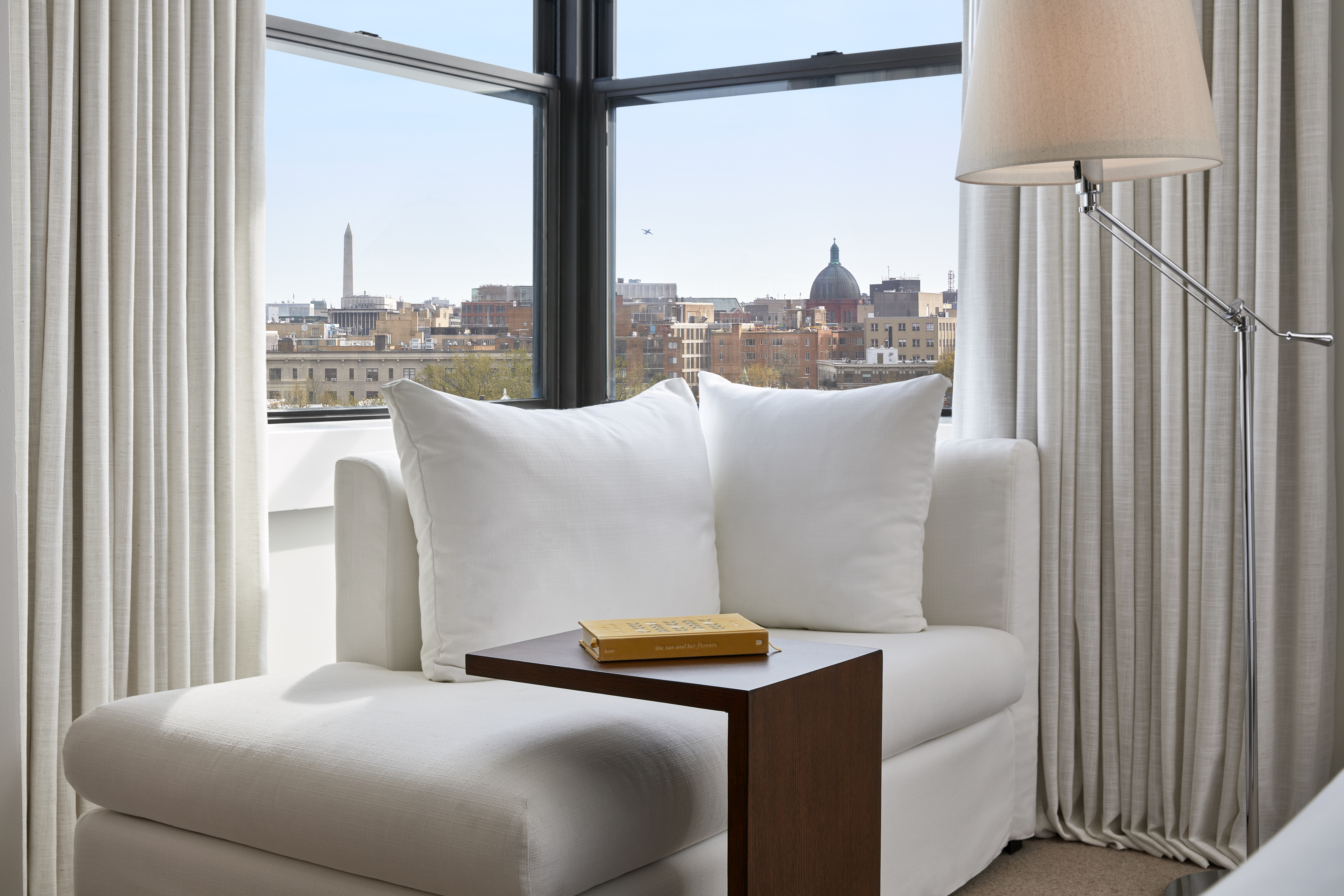Chair by window with view of Dupont Circle, Washington, D.C.