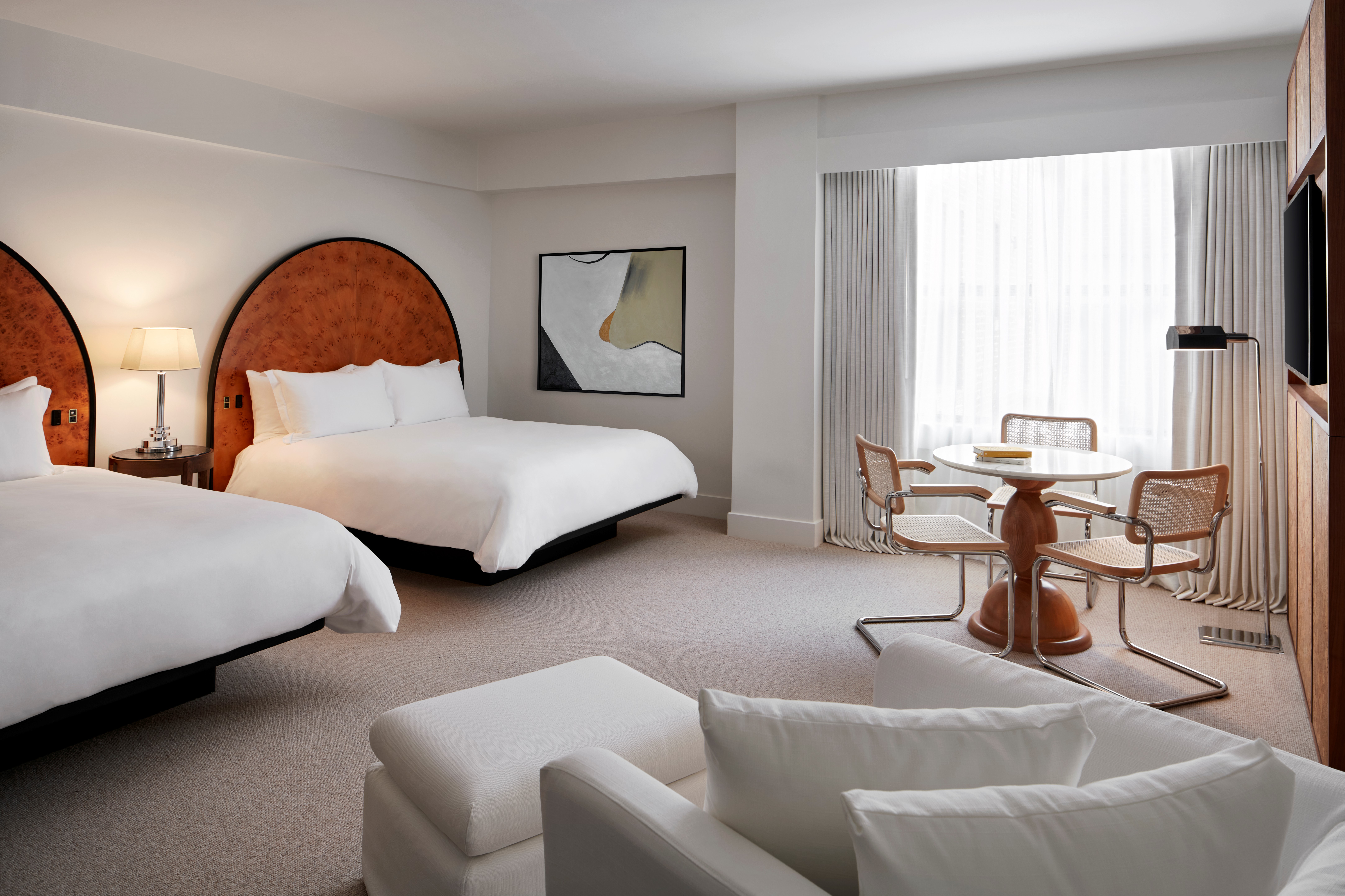 View of entire Deluxe Double Queen room at Lyle.