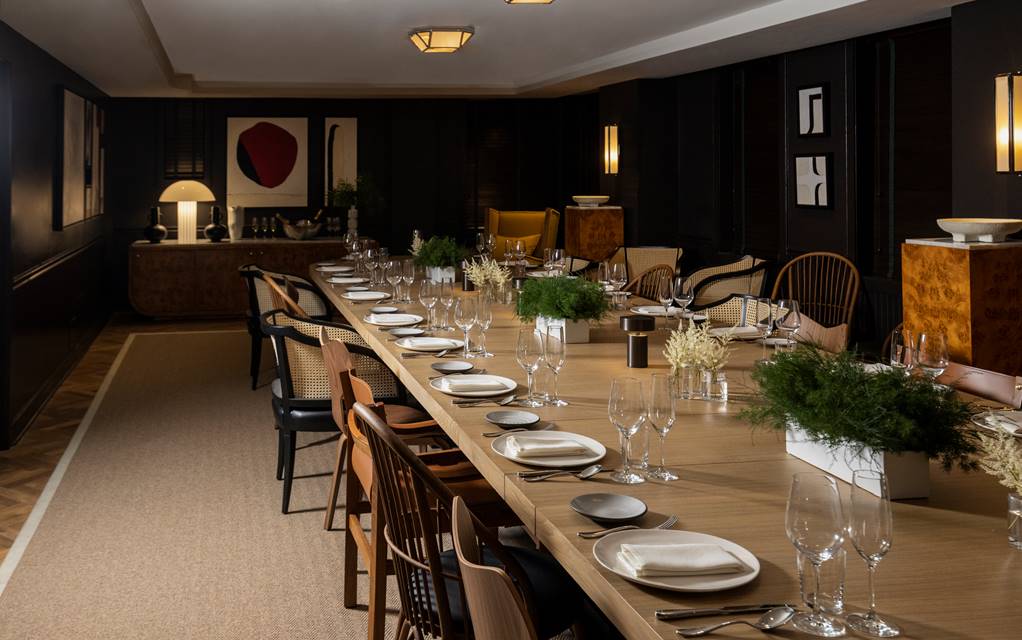 Long table in Parlor room set for dinner
