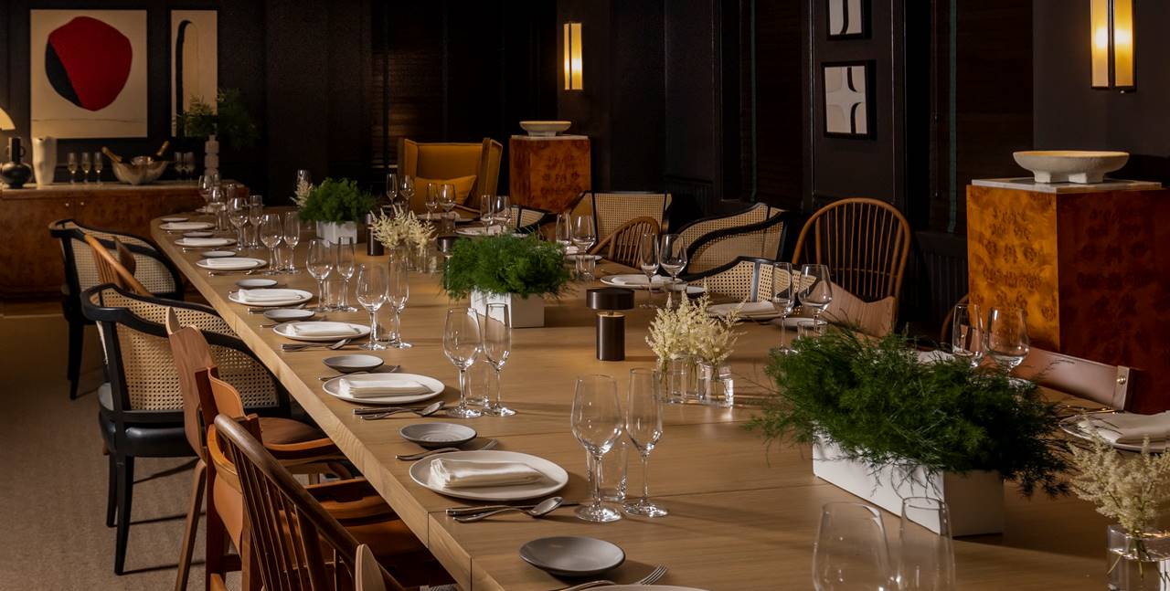 Lyle Parlor Table Setting in a private room with natural furnishing elements.
