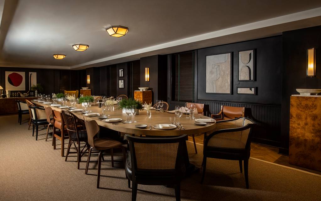 Parlor room set for dinner